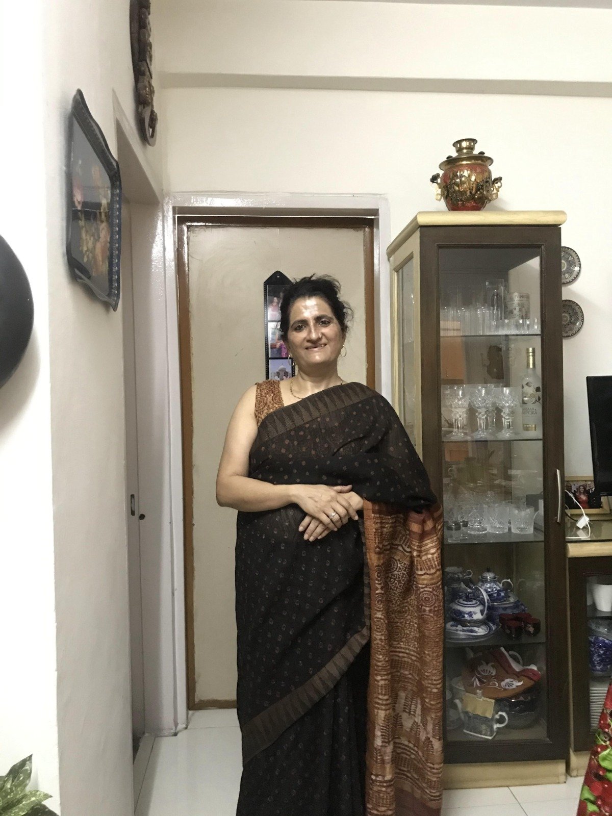 Anju Mehta in a black Teevra saree with a rust border